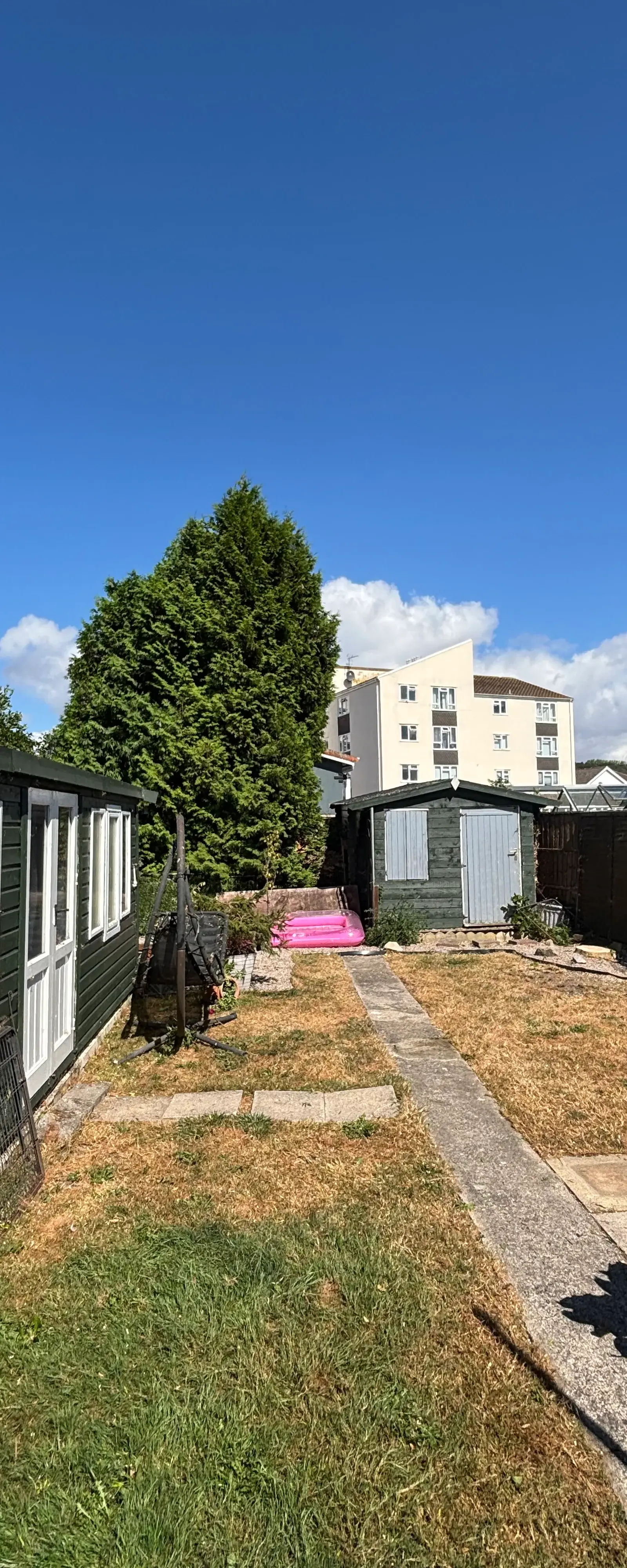 Garden and work area before tree and grounds work